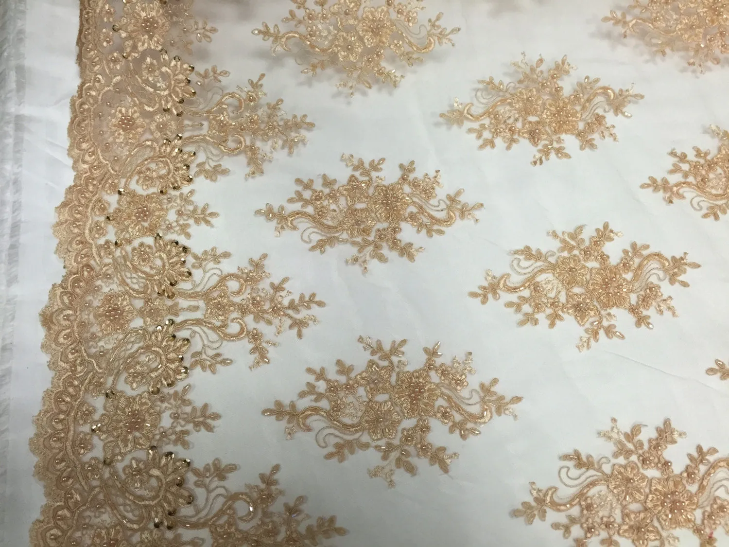 Skin/ nude marvelous design embroider and beaded on a mesh lace -Sold by the yard